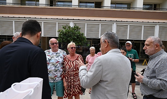 Alman ikili Lider Topaloğlu’ndan teşekkür plaketi